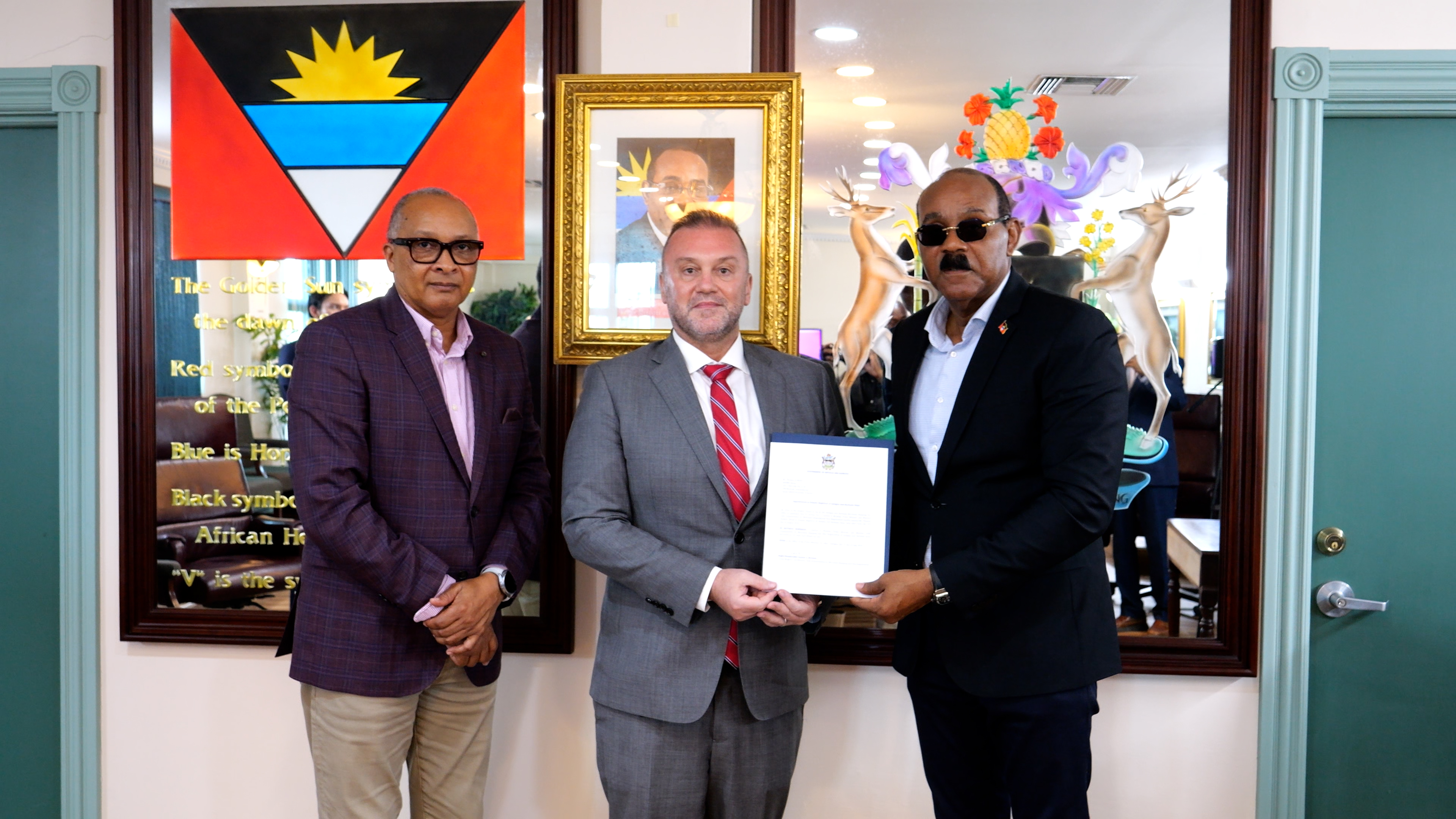 Prime Minister the Rt. Hon. Gaston Browne, Ambassador Dwight C.R. Gardiner OBE and Thomas Blenk at the signing of the ADOMS Busan Office agreement